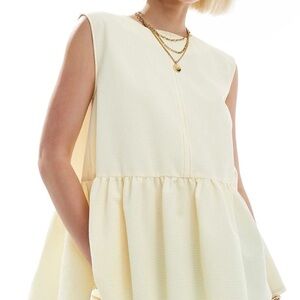 Sleeveless Yellow Peplum Top